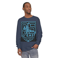 Man wearing navy long sleeve tee with '95 East York x Jersey' graphic, featuring city skyline design in blue.