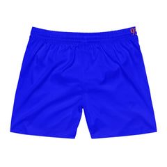Vibrant blue athletic shorts with orange '95' logo on waistband, modern sportswear design