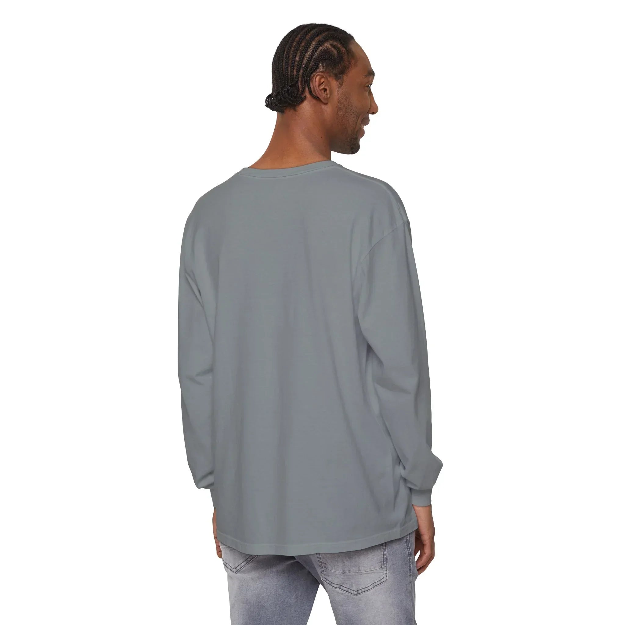 Man wearing gray long sleeve t-shirt with relaxed fit, styled with light wash jeans for casual everyday wear