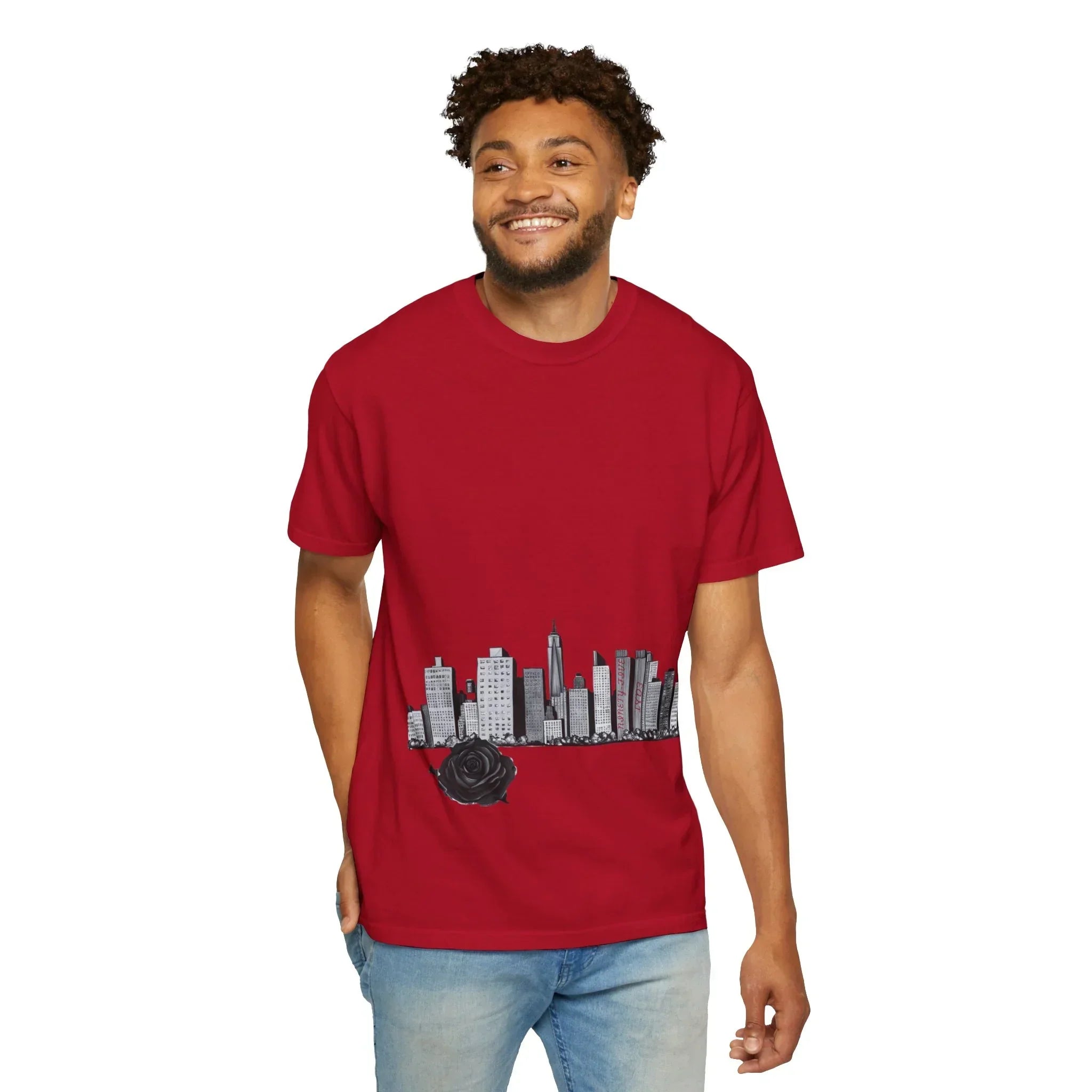 Man wearing red graphic tee with city skyline and black rose design, modern urban streetwear style