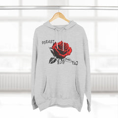 Gray hoodie with red rose graphic and 95EAST YxJ text, hanging on wooden hanger