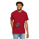 Man wearing red t-shirt with black rose graphic, casual streetwear style