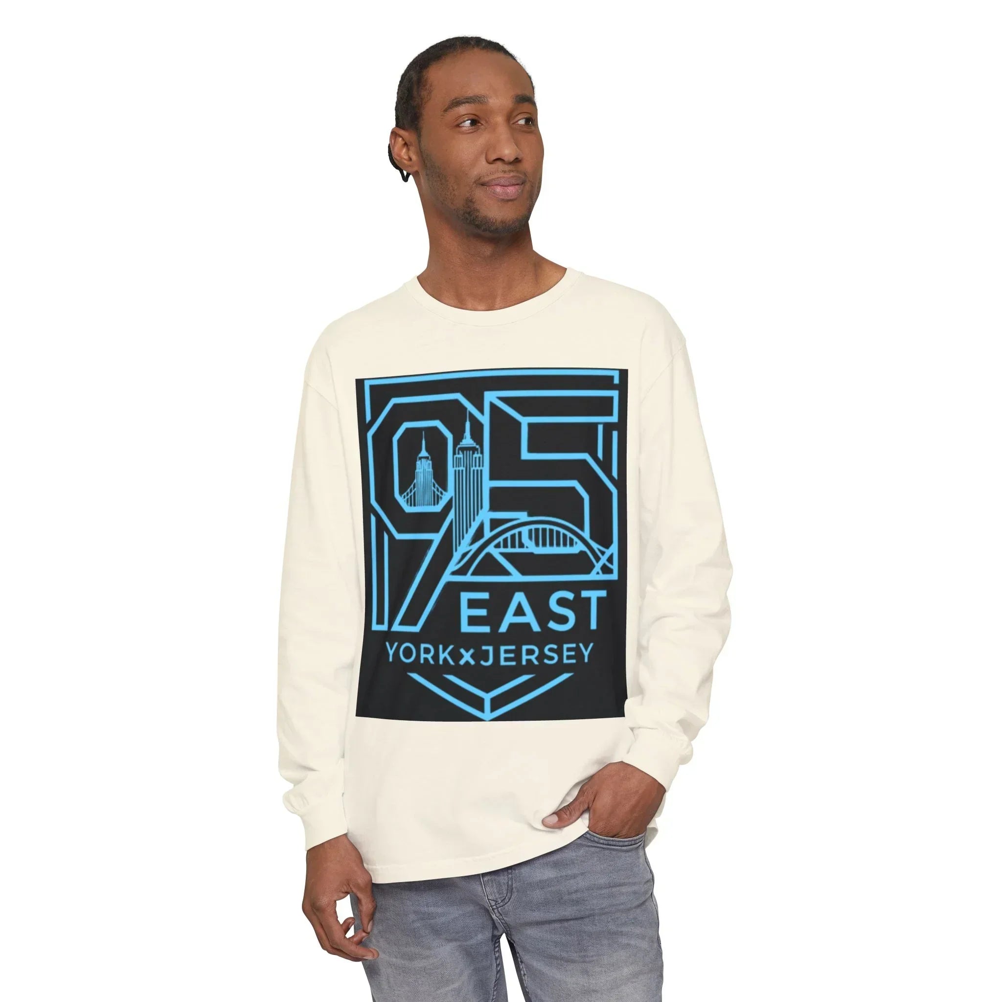 Cream long sleeve tee with bold 95 East YorkxJersey graphic, featuring city skyline design in blue and black.