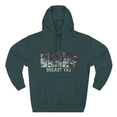 Dark green hoodie with abstract graphic panels and '95EAST YXJ' text on front.