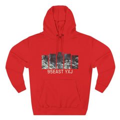 Red hoodie with abstract black and white graphic and 95EAST YXJ text on front