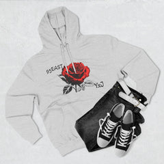 Gray hoodie with red rose graphic and 95EAST YxJ text, styled with jeans and sneakers