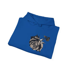 Blue hoodie with black and white rose graphic on front, folded on white background