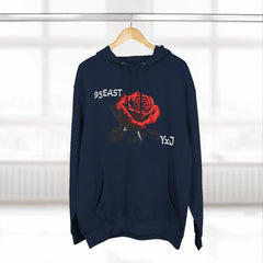 Black hoodie with red rose graphic and barcode sleeve detail, 95EAST YxJ design