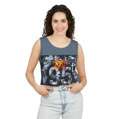 Woman wearing gray sleeveless tank top with bold NYC 95 graphic print, paired with light wash jeans.