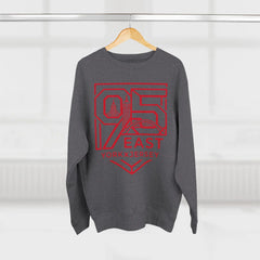 Gray hoodie with red 95 East YorkxJersey graphic, hanging on wood hanger