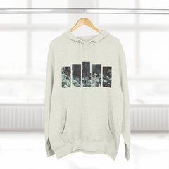 Light grey hoodie with abstract ocean-inspired graphic on front, displayed on hanger indoors