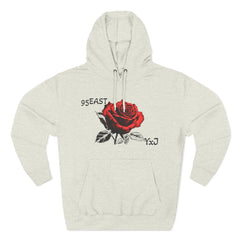 Black hoodie with red rose graphic and barcode sleeve detail, 95EAST YxJ design