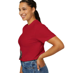 Woman in red graphic tee with rose print, styled with jeans for casual everyday wear