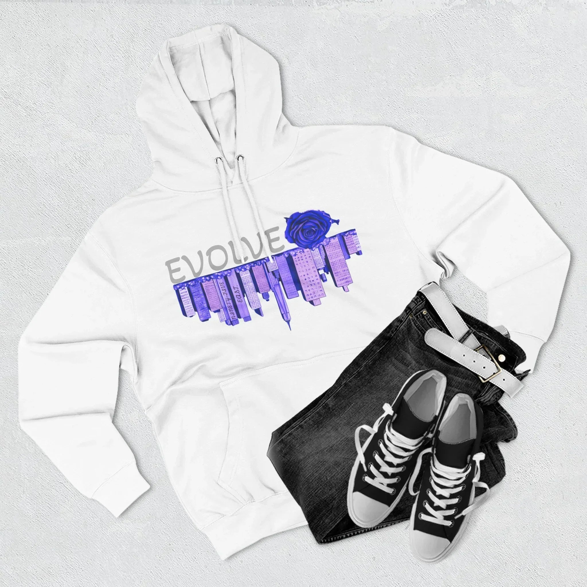 White hoodie with purple city skyline and rose graphic, paired with black jeans and sneakers