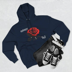 Navy hoodie with red rose graphic and '95EAST YxJ' text, styled with jeans and sneakers
