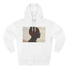 White hoodie with a beach silhouette photo and red letter detail on the front
