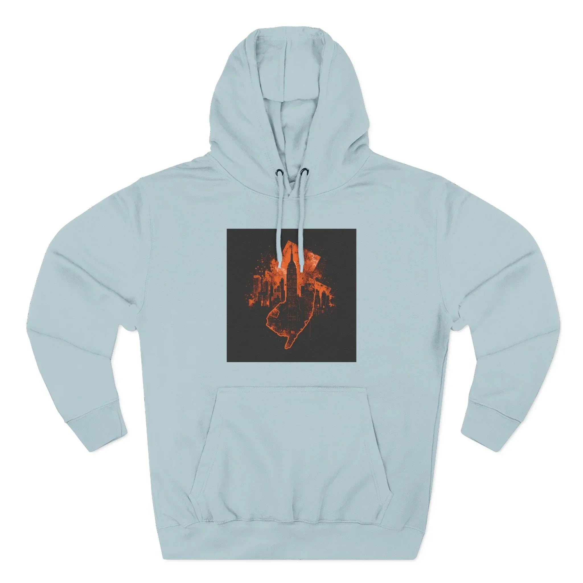 Light blue hoodie with orange cityscape and hand graphic on chest.