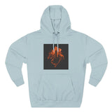 Light blue hoodie with orange cityscape and hand graphic on chest.