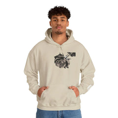 Man wearing beige hoodie with black rose graphic on chest, casual streetwear style