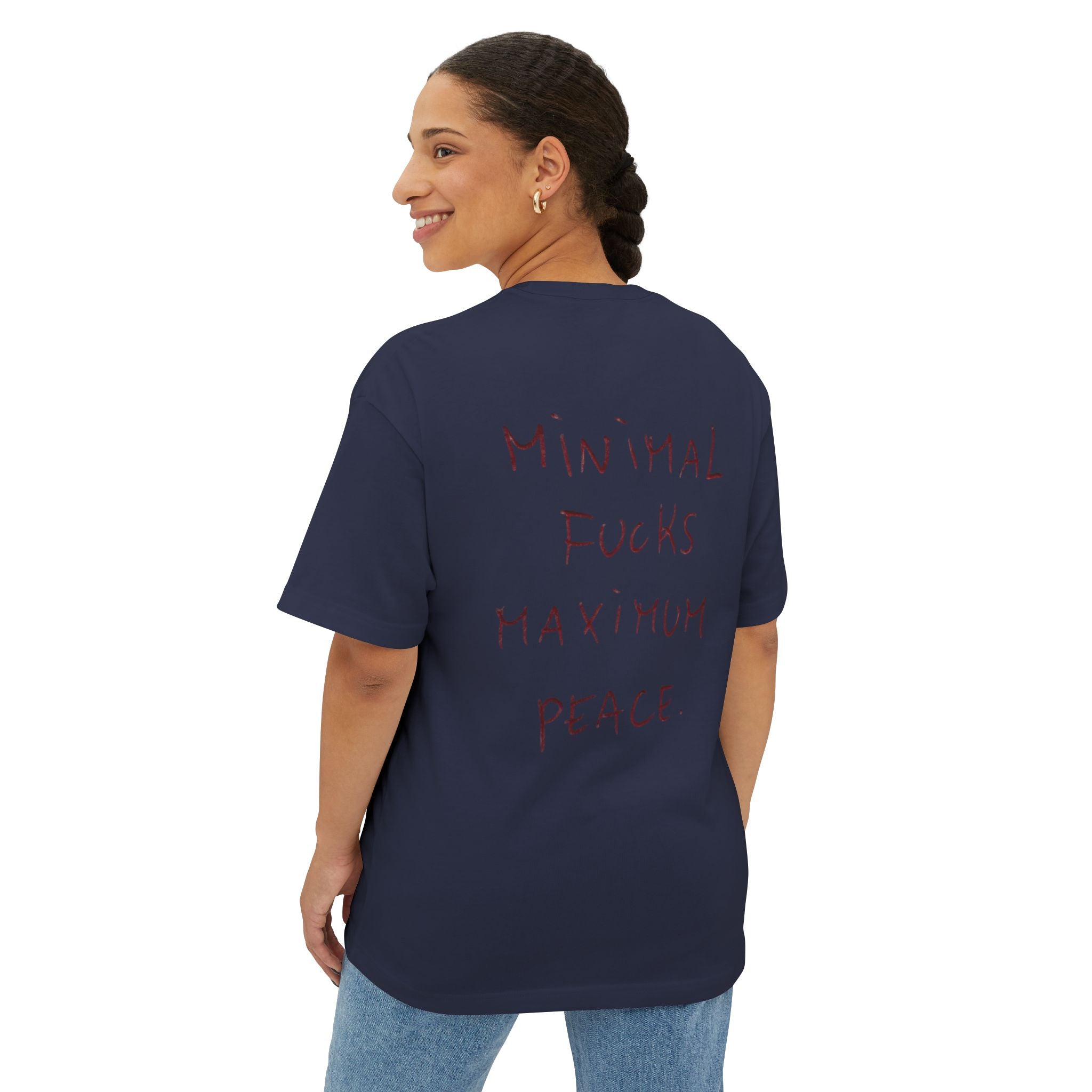Navy oversized t-shirt with 'Minimal Fucks Maximum Peace' graphic text on back, worn by woman