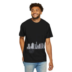 Man wearing black T-shirt with city skyline and rose graphic design