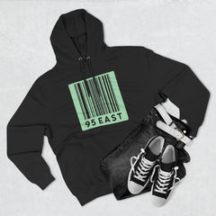 Black hoodie with green barcode design, paired with jeans and sneakers for casual streetwear style.