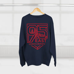 Navy hoodie with red 95 East YorkxJersey graphic, city skyline design, hanging on wood hanger