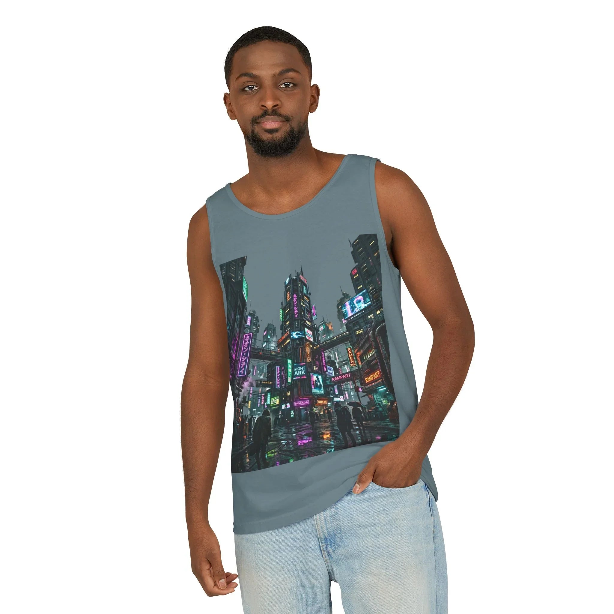 Man wearing blue tank top with vibrant cityscape graphic and light wash jeans