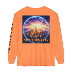 Orange long sleeve tee with 'Kings of New York City' graphic, NYC skyline inside globe, sleeve text