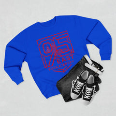 Blue hoodie with red 95 East YorkxJersey graphic, paired with black jeans and sneakers