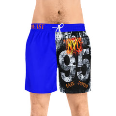 Blue swim trunks with NYC 95 graphic, East Supply text, and bold street art design
