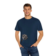 Man wearing navy blue t-shirt with black and white rose graphic, paired with jeans for casual style