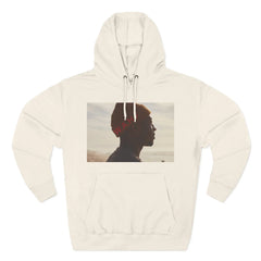 Beige hoodie with silhouette photo of man in beanie and letters W.A.H. on chest