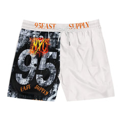 White drawstring shorts with NYC 95 graphic print and 95EAST SUPPLY waistband, urban streetwear style