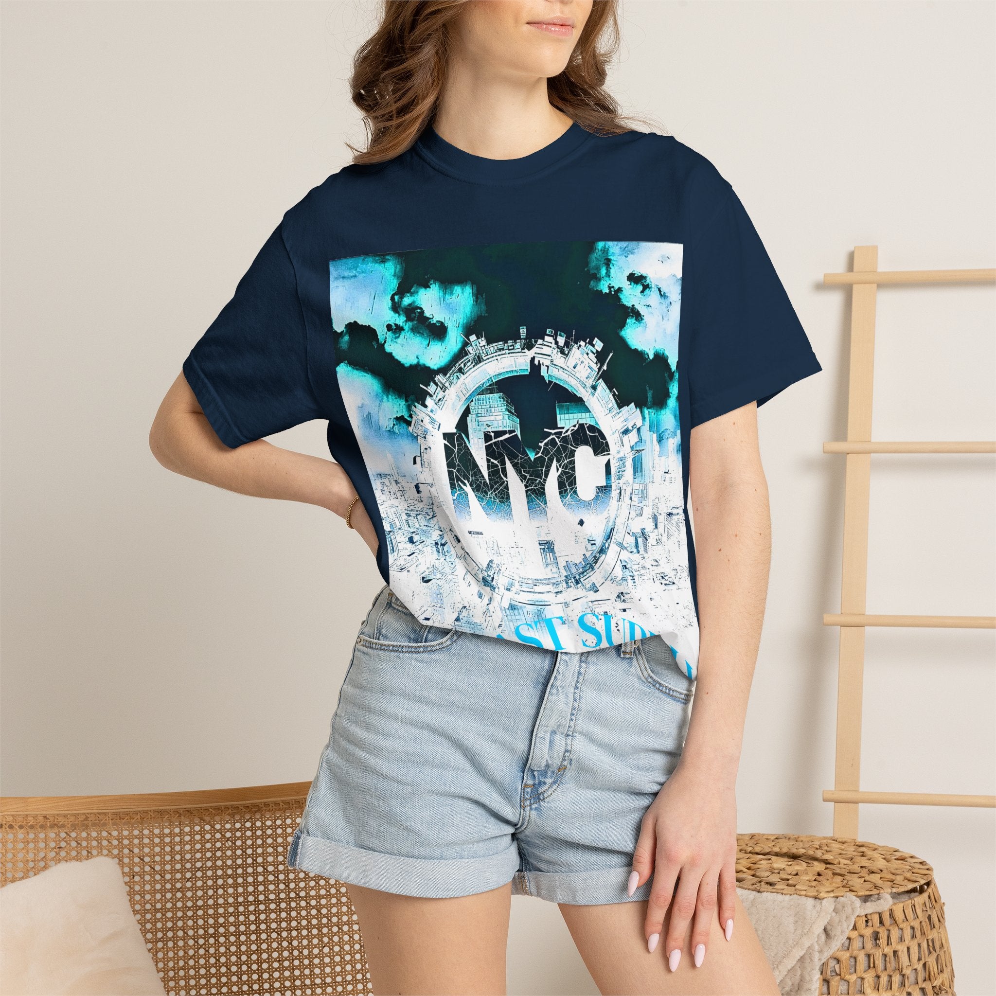 Navy blue crop tee with NYC cityscape graphic, worn with denim shorts for casual streetwear style