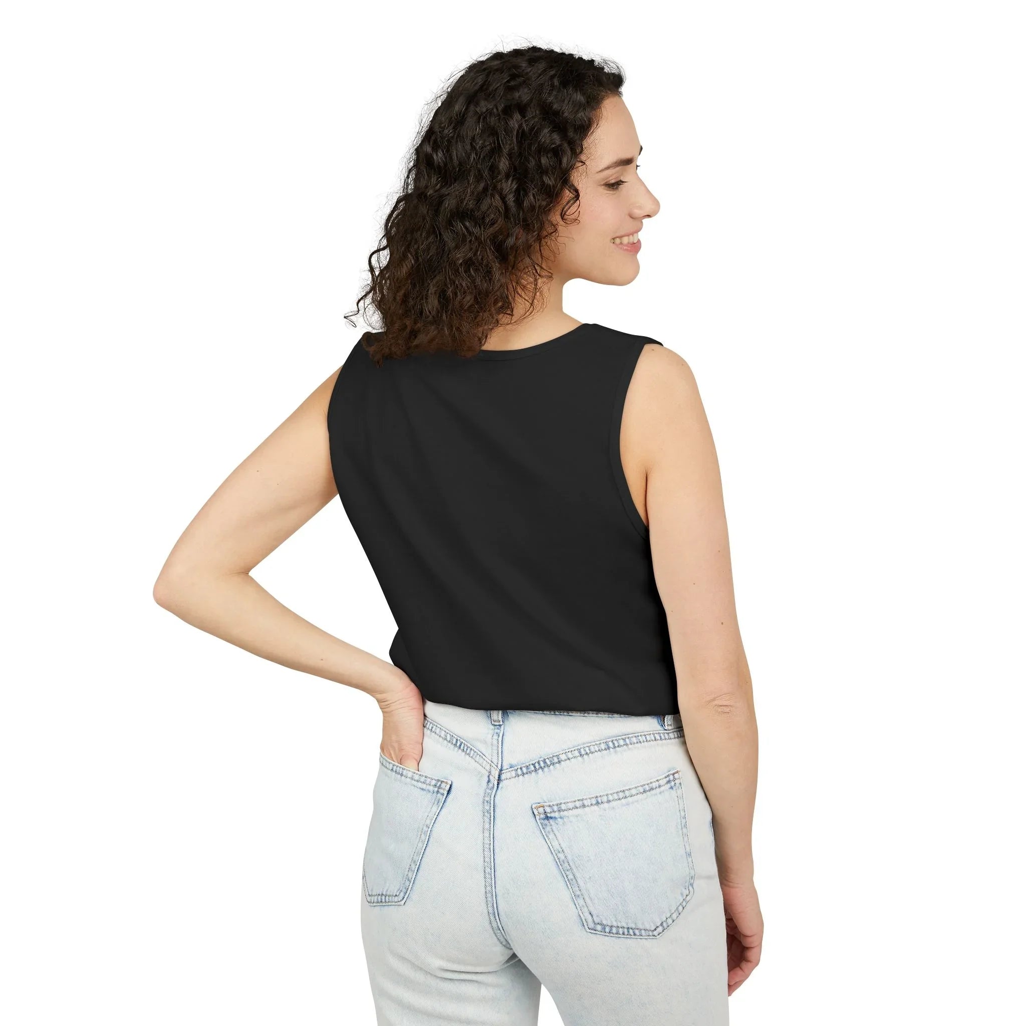 Woman wearing a sleeveless black crop top and light wash jeans, shown from the back