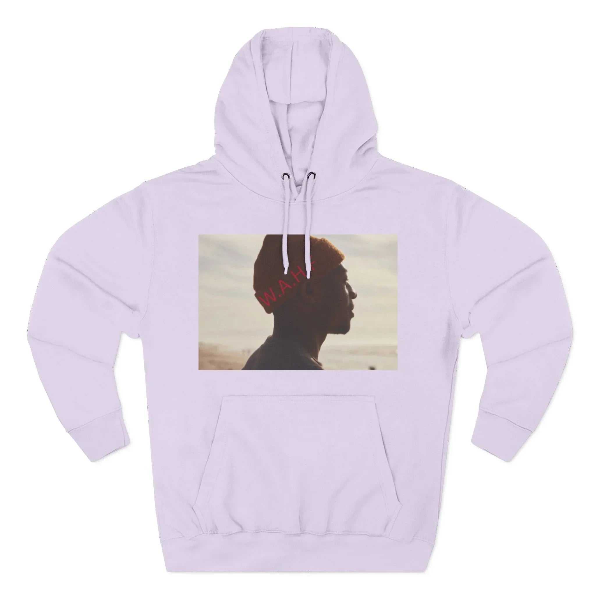 Lilac hoodie with graphic of man in orange beanie and beach background, word W.A.H. in red.