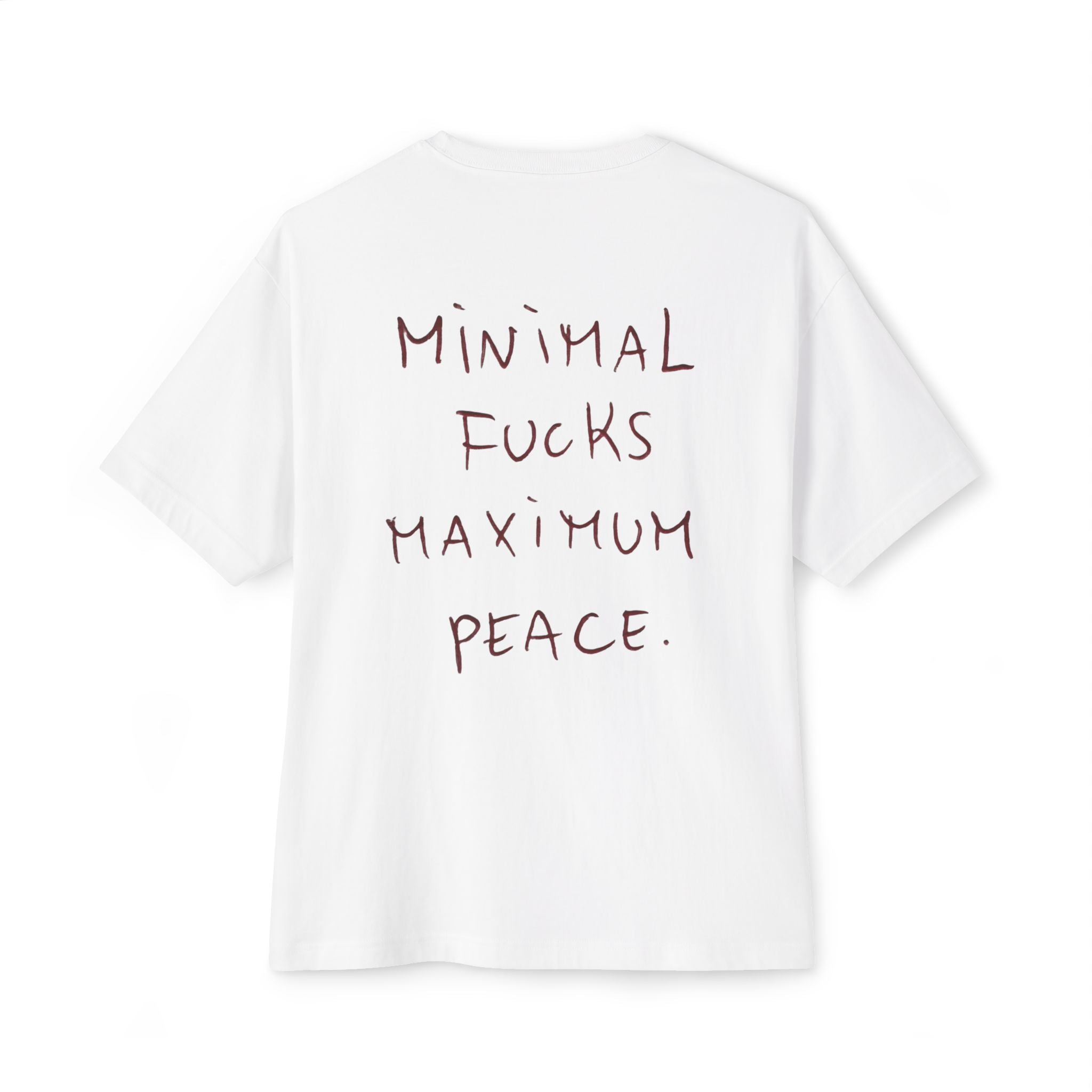 White graphic tee with handwritten 'Minimal Fucks Maximum Peace' slogan, modern streetwear style