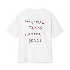 White graphic tee with handwritten 'Minimal Fucks Maximum Peace' slogan, modern streetwear style