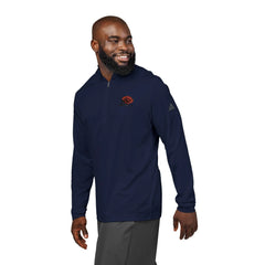 Man wearing navy quarter-zip pullover with red rose embroidery and athletic gray pants
