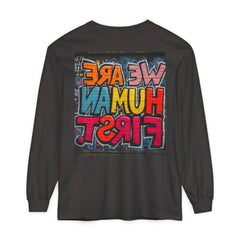 Black long sleeve shirt with colorful graffiti text graphic reading 'WE ARE HUMAN FIRST' on back
