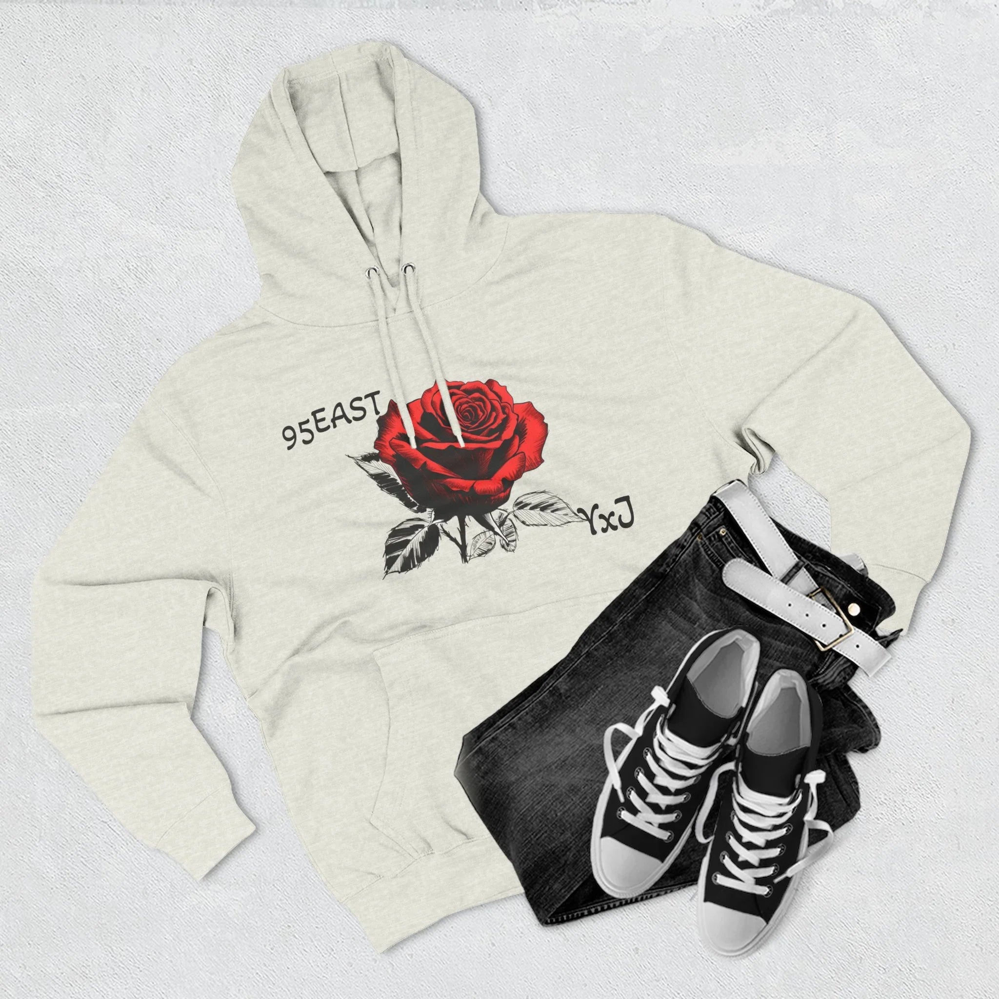 Black hoodie with rose graphic and barcode sleeve detail