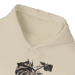 Beige hoodie with black and white rose graphic and drawstring hood