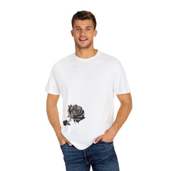 Man wearing white t-shirt with black rose graphic, casual style