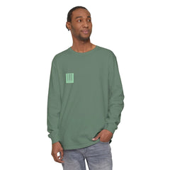 Man wearing olive green long sleeve tee with barcode graphic, casual streetwear style