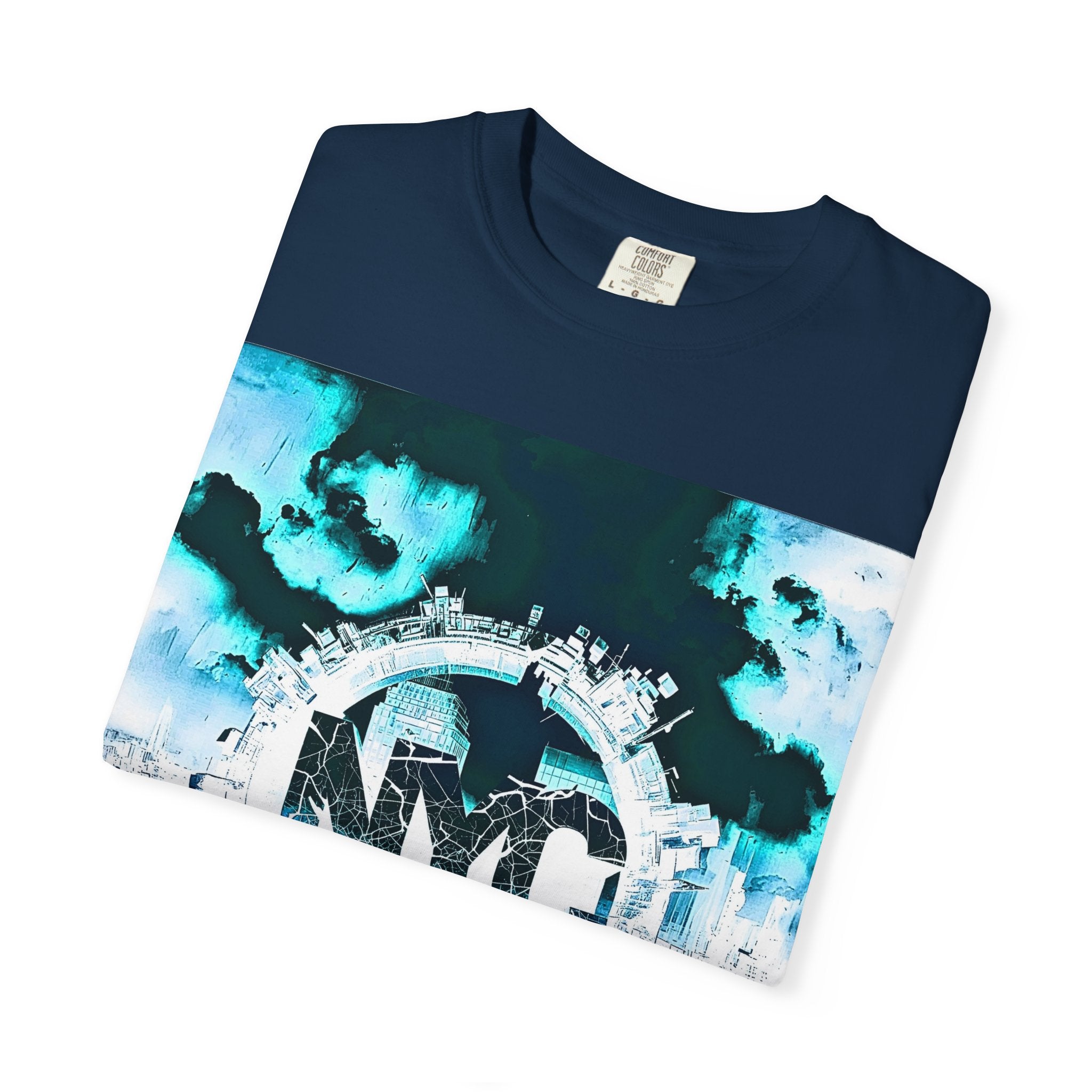 Navy blue t-shirt with abstract city skyline graphic in teal and white, folded on white background