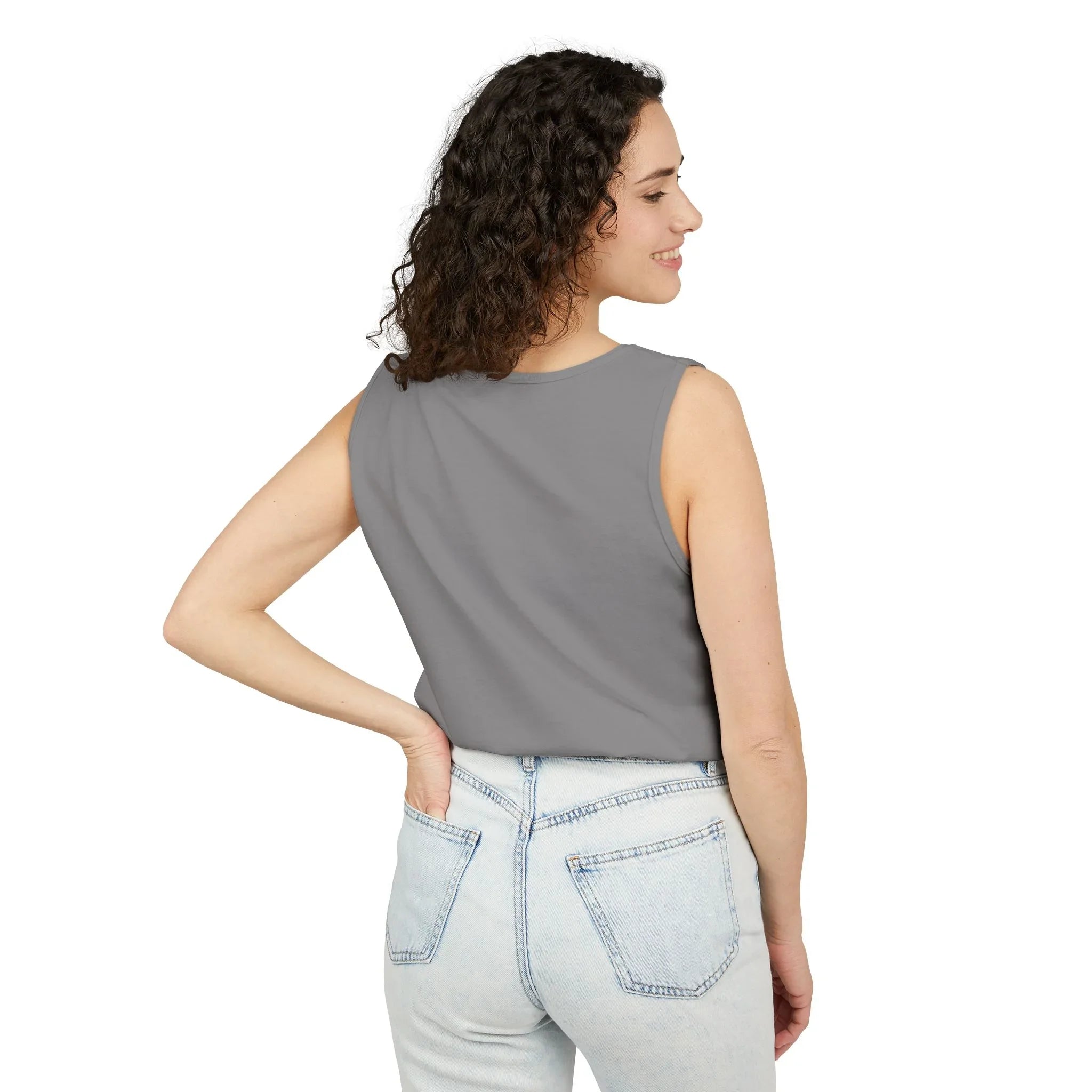 Woman in gray sleeveless top and light wash jeans, back view