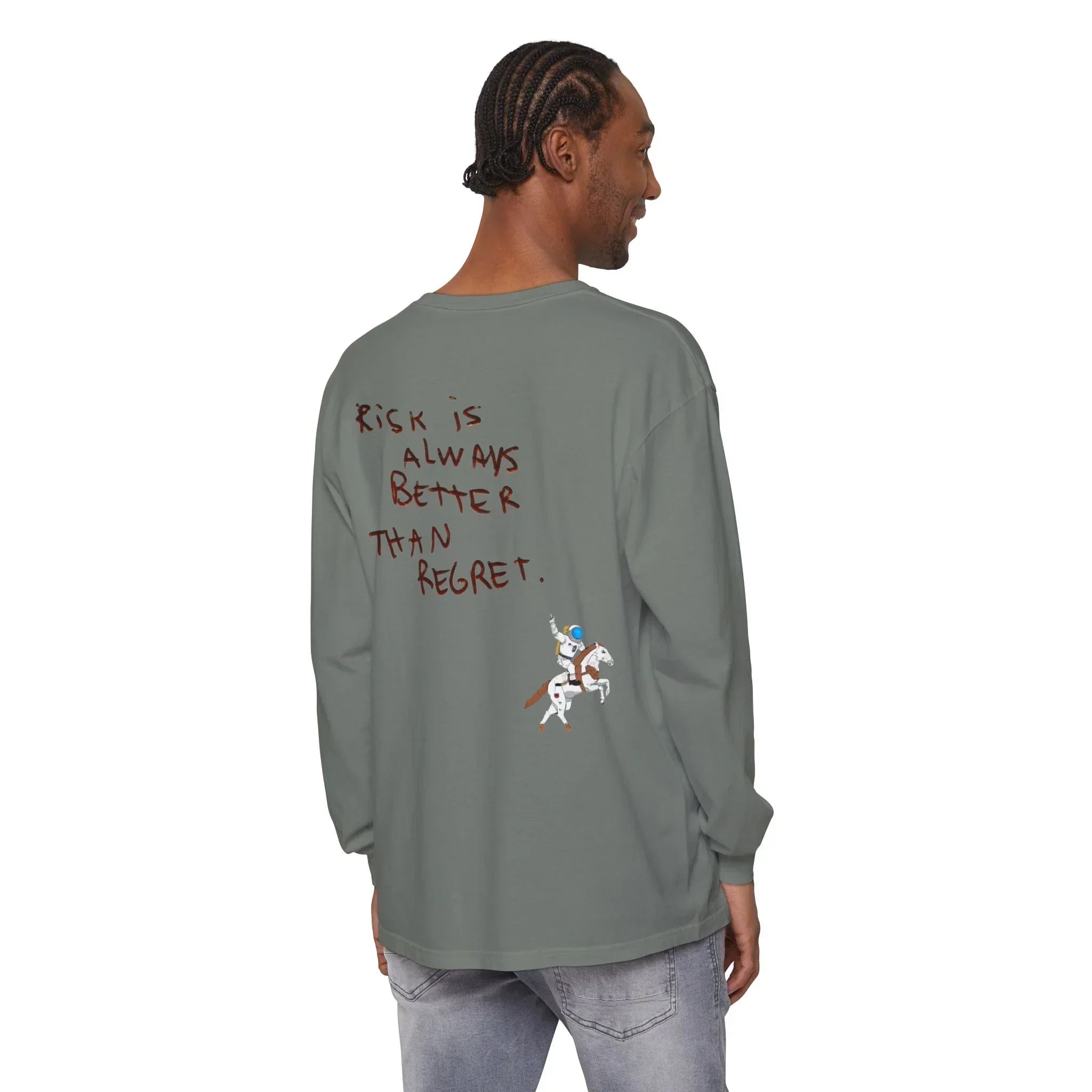 Man wearing olive long sleeve shirt with 'Risk is Always Better Than Regret' quote and astronaut on horse graphic