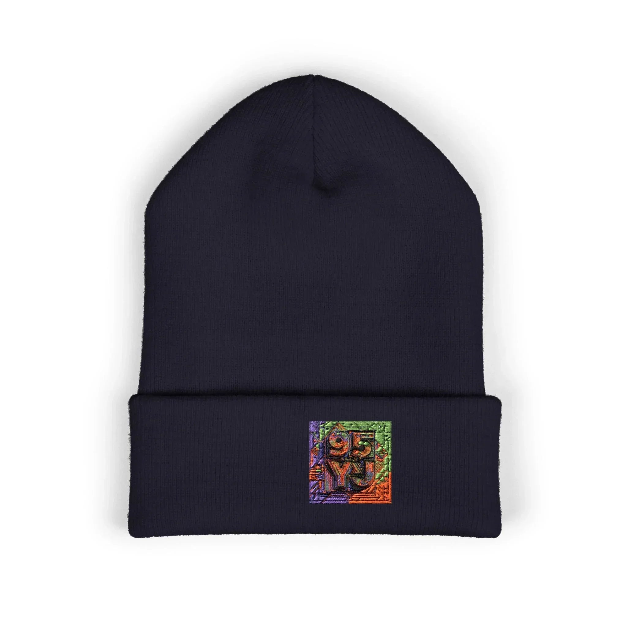 Black beanie with colorful embroidered patch logo on front cuff, minimalist background.