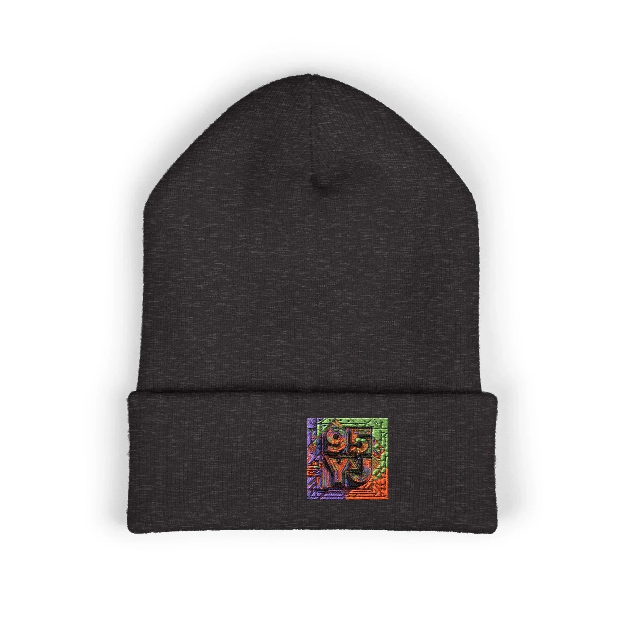 Black knit beanie with colorful embroidered patch featuring abstract square design